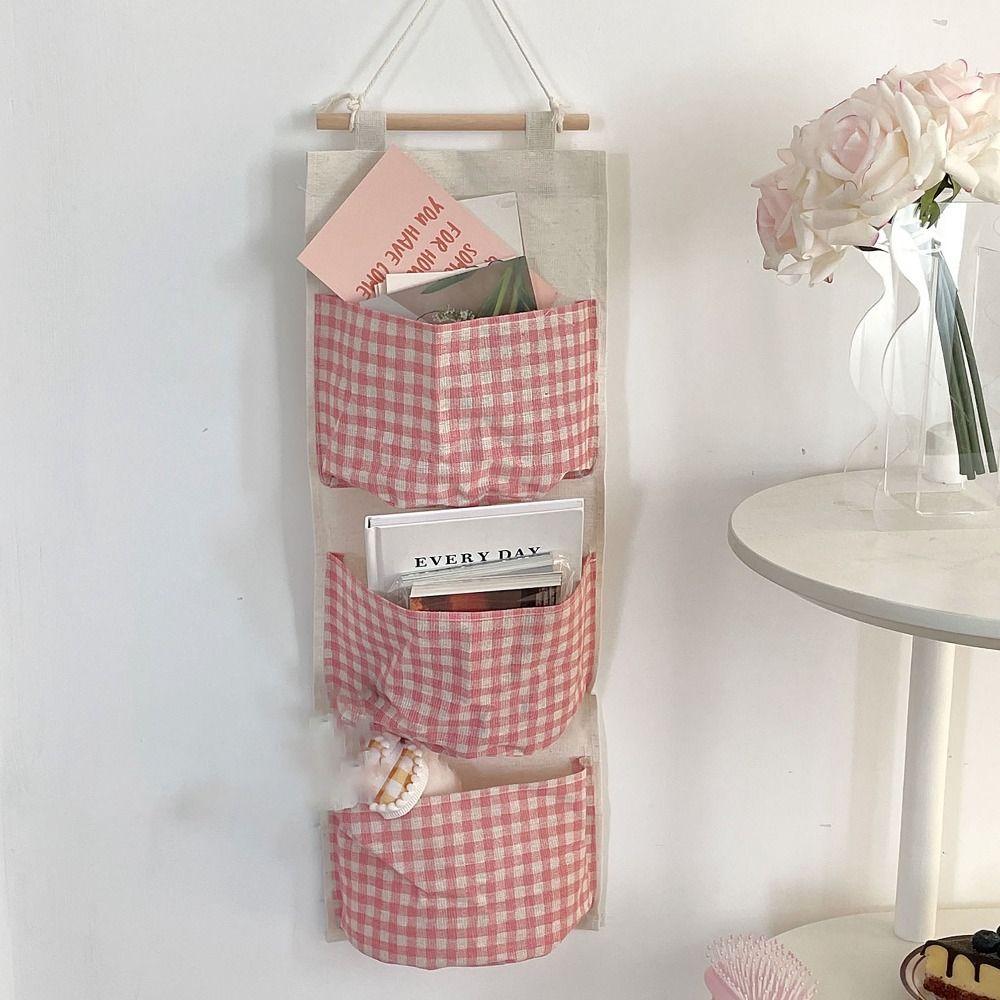1pc Large Capacity Pink Plaid Hanging Storage Bag - Multifunctional, Waterproof, Breathable Fabric Organizer with Multiple Compartments for Home Organization, Clothes Organizer Storage