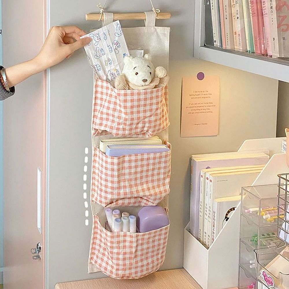 1pc Large Capacity Pink Plaid Hanging Storage Bag - Multifunctional, Waterproof, Breathable Fabric Organizer with Multiple Compartments for Home Organization, Clothes Organizer Storage