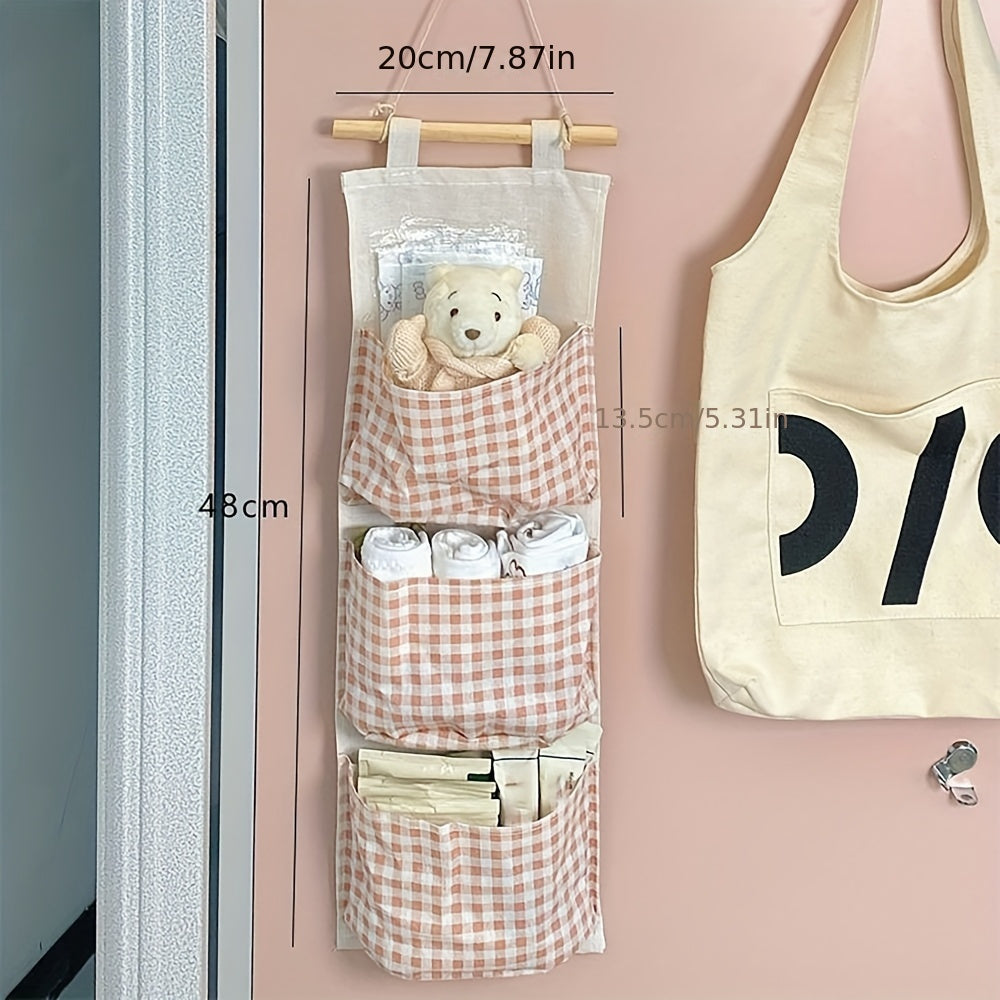 1pc Large Capacity Pink Plaid Hanging Storage Bag - Multifunctional, Waterproof, Breathable Fabric Organizer with Multiple Compartments for Home Organization, Clothes Organizer Storage